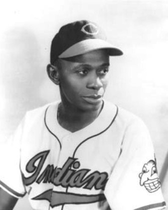Satchel Paige signs with the Cleveland Indians